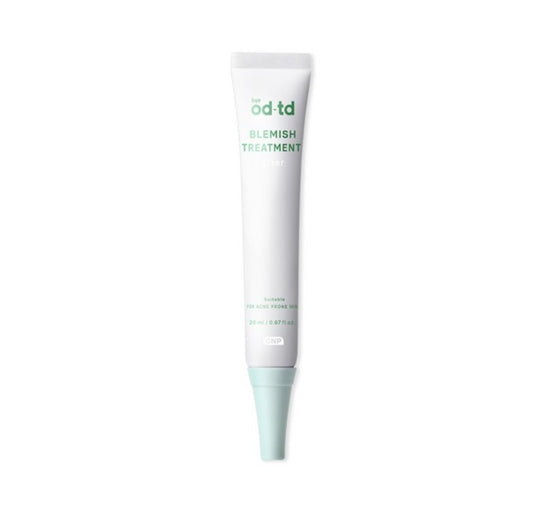 Tube of 'td td' blemish treatment on a white background