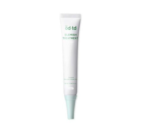 Tube of 'td td' blemish treatment on a white background