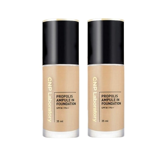 Two bottles of CNP Laboratory Propolis Ampoule In Foundation on a white background
