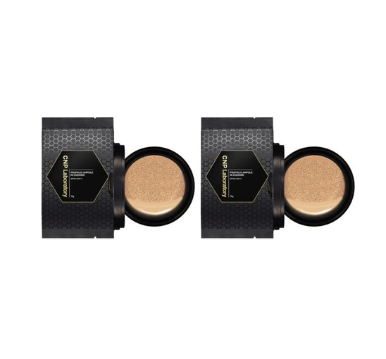 Two black cosmetic containers with beige powders on a white background