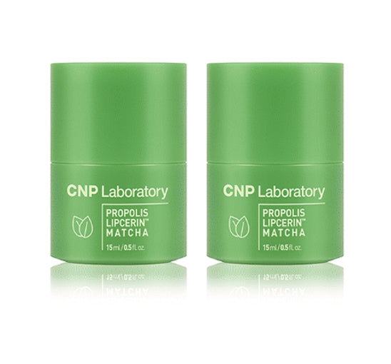 Two green lip balm containers with CNP Laboratory branding on a white background