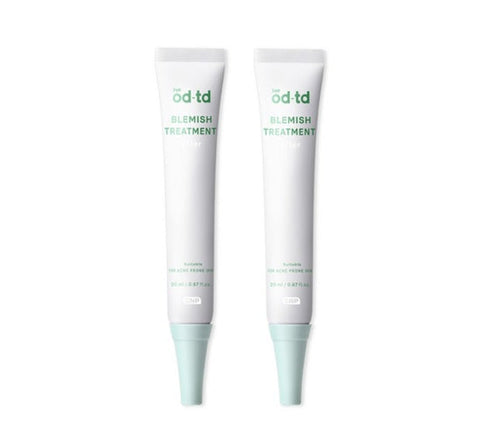 Two tubes of 'od td blemish treatment' on a white background