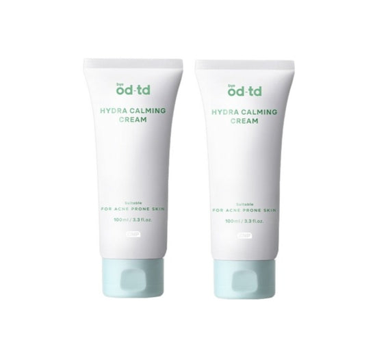 Two tubes of 'od td' Hydra Calming Cream on a white background