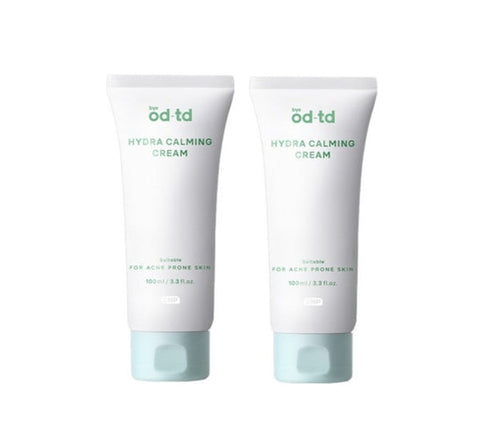 Two tubes of 'od td' Hydra Calming Cream on a white background