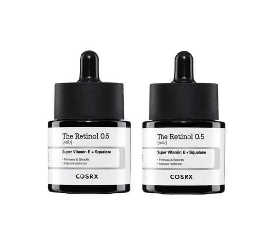 Two bottles of COSRX The Retinol 0.5 skincare product on a white background