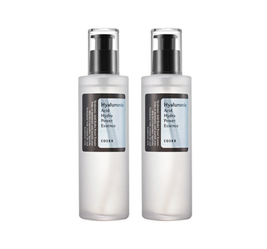 Two bottles of Hyaluronic Acid Power Essence on a white background