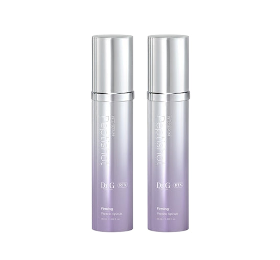 Two silver and purple skincare bottles on a white background