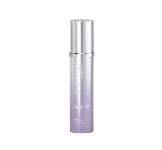 Skincare bottle with silver cap and purple body on a white background