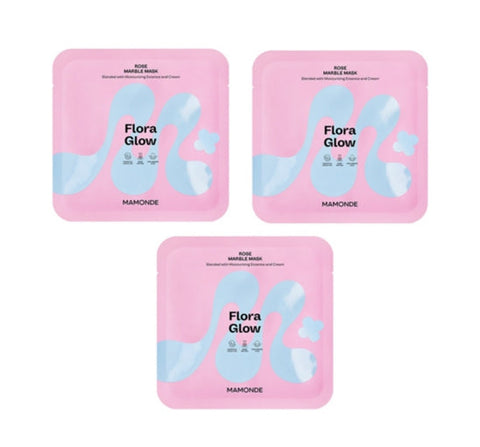 Three pink 'Flora Glow' face mask packages with blue designs on a white background.