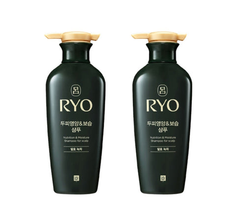 Two black RYO shampoo bottles with gold caps on a white background
