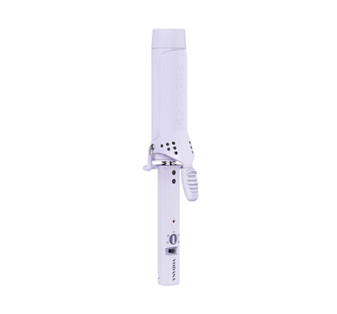 White hair straightener with black polka dots on a white background